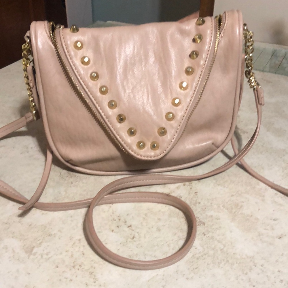 Cross body purse, She & Lo tan with gold trim included metallic studs.